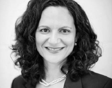 A cropped black and white headshot of Rebecca Winter, Microsoft Talent Management Director for EMEA and Asia.